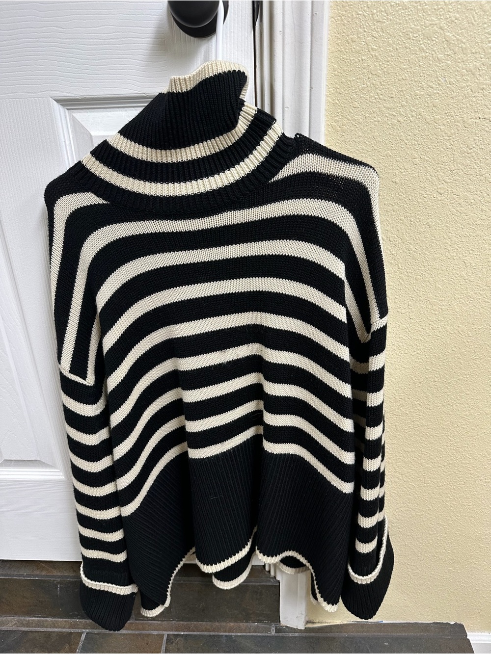 Toteme Black and Cream Striped Turtleneck Sweater